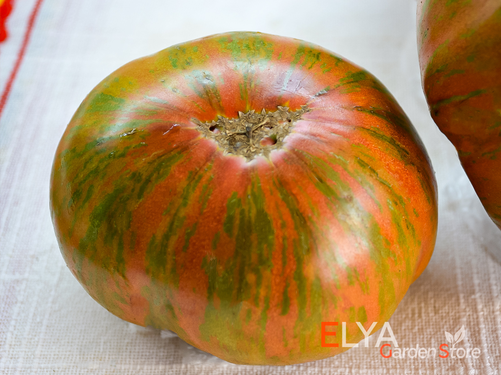 Коллекционный сорт томата Ананасная Зебра - красивый и очень вкусный томат - фото магазина семян Elya Garden 