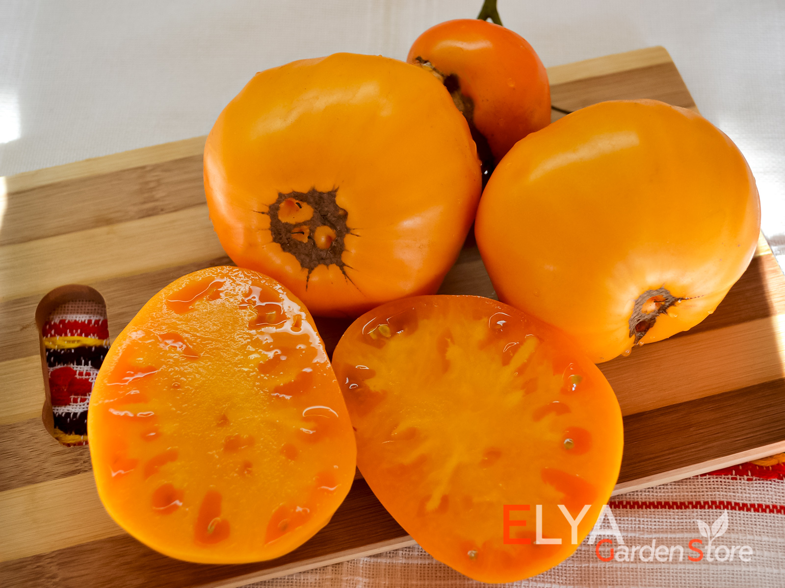 Коллекционный сорт томата Джамбо Джим Оранж - вкусный, стабильно урожайный - фото магазина семян Elya Garden